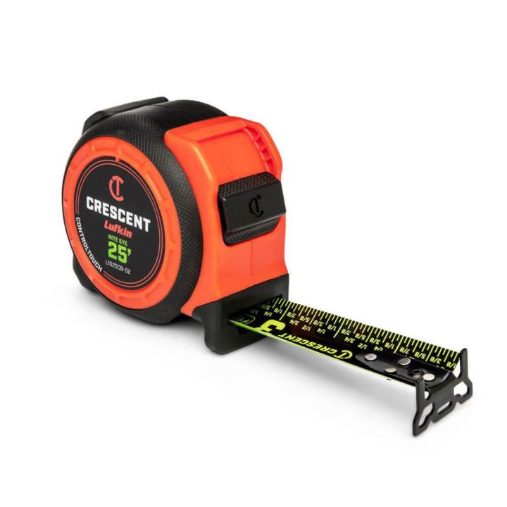 Crescent CONTROLTOUCH NITE EYE 25' tape measure angled with 3" of the blade extended towards the lower right corner on a white background