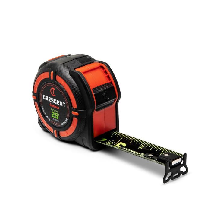 Crescent  LM1125NE  1-1/4 x 25' WORKHORSE NITE EYE Magnetic Tape Measure  sitting on an angle with the blade end hook and blade lock facing the lower right corner with the blade extended 3 inches on a white background